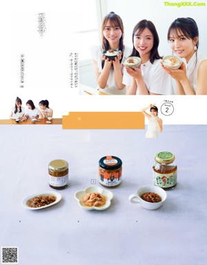 A group of young women eating food on a table.